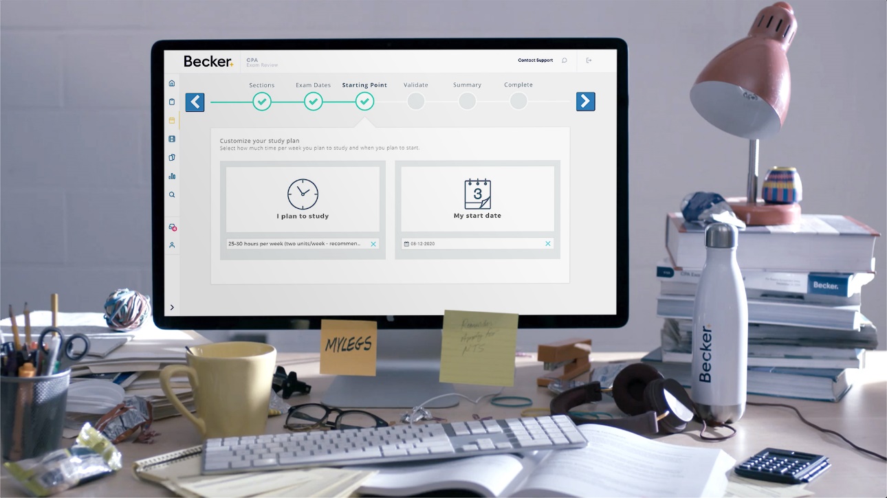 A desktop computer monitor sitting on top of a desk
Description automatically generated