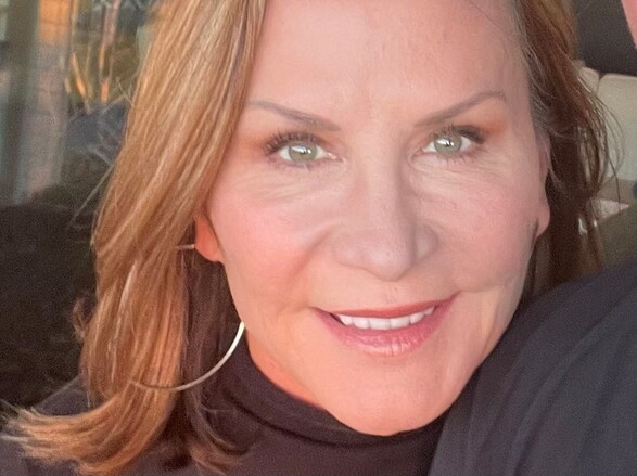 A person smiling for the camera
Description automatically generated with medium confidence